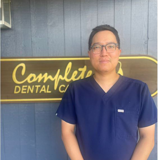 Sumner dentist Doctor W Brent Nash smiling in the dental office