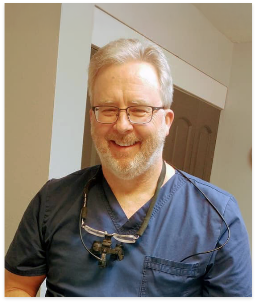 Sumner dentist Doctor Brent Nash smiling in the dental office